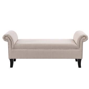 A traditional light beige upholstered roll-arm entryway bench with metallic nailhead trim and dark espresso wooden legs set against a white studio background.